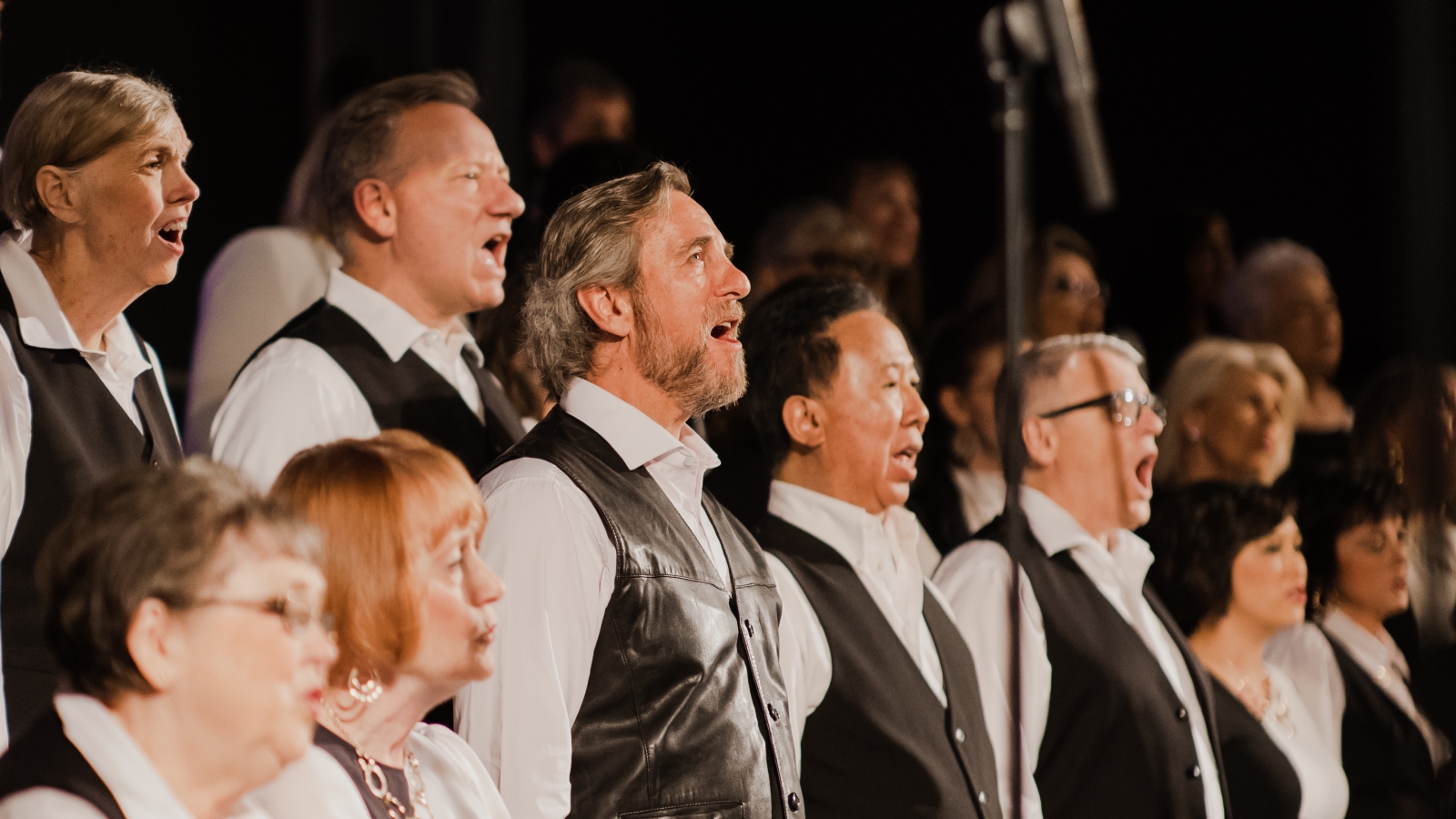 Members of the Up2Something choir performing in 2022.